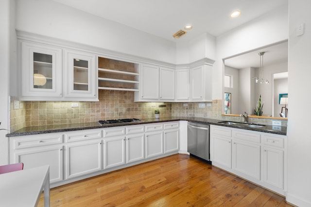 kitchen with a sink, light wood-style flooring, appliances with stainless steel finishes, white cabinets, and open shelves