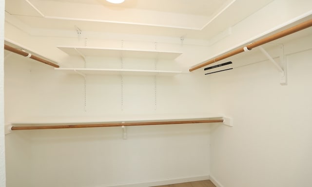 walk in closet featuring light wood-type flooring