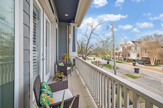 balcony featuring a residential view