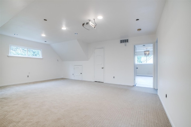 18531 Point Lookout Dr, Houston, TX 77058 - additional living space with light carpet, baseboards, plenty of natural light, recessed lighting, and vaulted ceiling