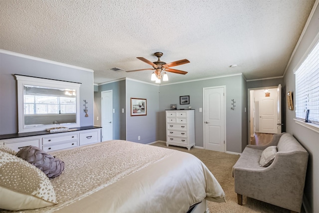 bedroom featuring visible vents, ornamental molding, a textured ceiling, baseboards, and light colored carpet