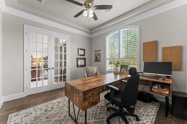 office featuring wood finished floors, visible vents, baseboards, ceiling fan, and french doors