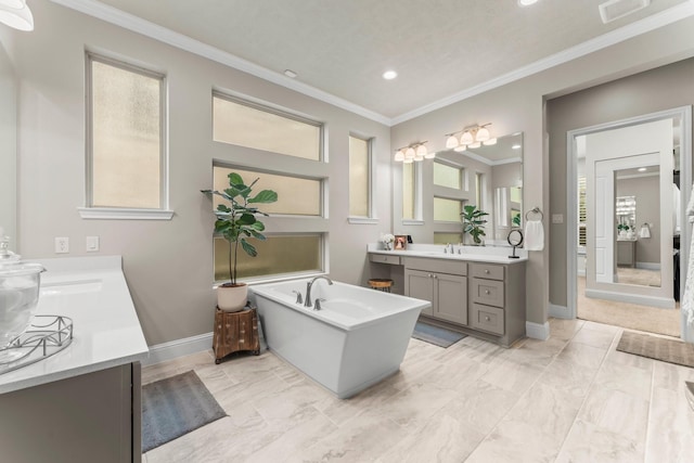 bathroom with visible vents, two vanities, ornamental molding, a sink, and marble finish floor