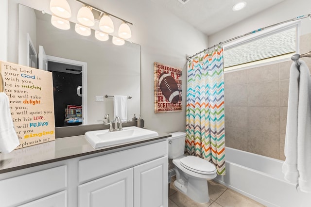 full bathroom with vanity, tile patterned floors, toilet, and shower / bathtub combination with curtain