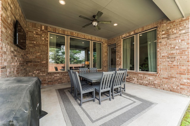 view of patio / terrace featuring outdoor dining area and a ceiling fan