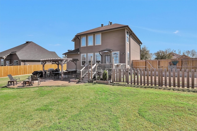 rear view of property featuring a yard, a patio area, a fenced backyard, and a pergola