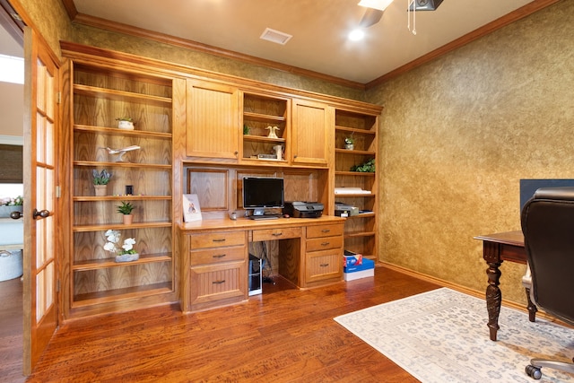 office space with visible vents, crown molding, dark wood-type flooring, and ceiling fan