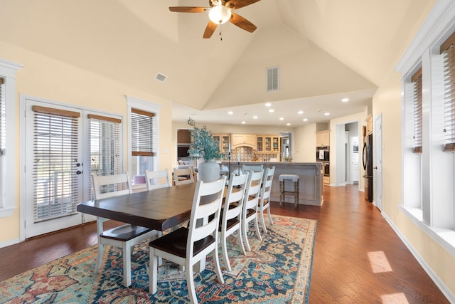 dining area featuring dark wood-style floors, visible vents, and ceiling fan