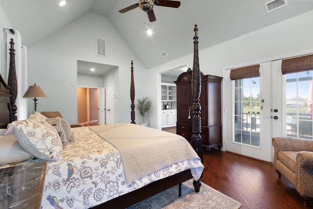 bedroom with high vaulted ceiling, visible vents, hardwood / wood-style floors, and access to outside