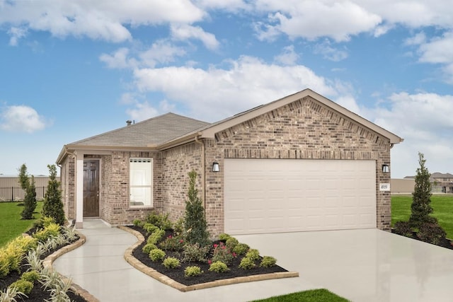 ranch-style home featuring a garage, brick siding, concrete driveway, and a front yard