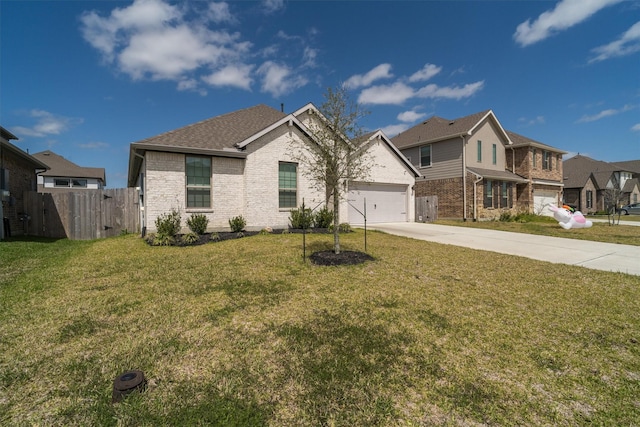 traditional-style home with brick siding, fence, a residential view, concrete driveway, and a front yard