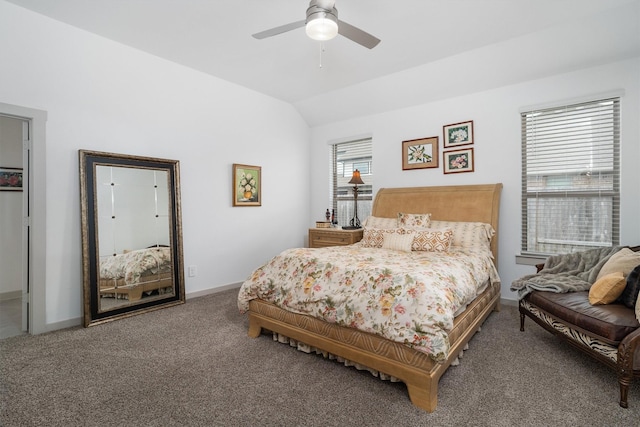 bedroom featuring baseboards, lofted ceiling, ceiling fan, and carpet flooring