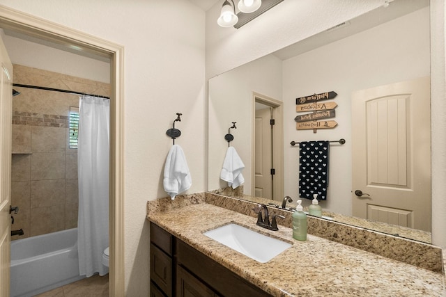 bathroom featuring vanity, shower / bathtub combination with curtain, visible vents, tile patterned flooring, and toilet