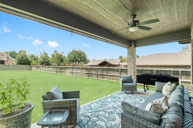 view of patio / terrace featuring ceiling fan, outdoor lounge area, and a fenced backyard