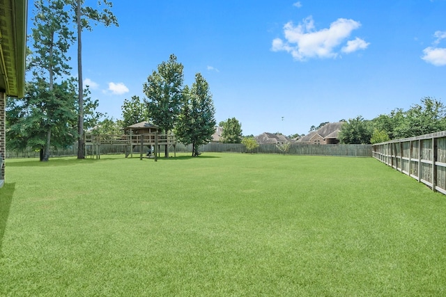 view of yard featuring a fenced backyard