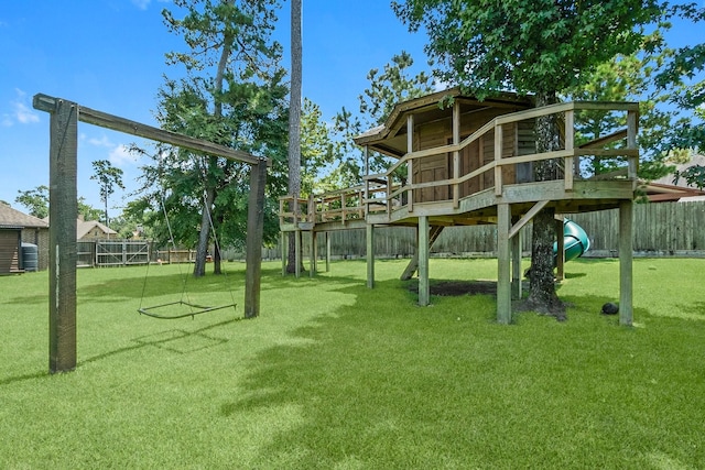 exterior space with a yard, a fenced backyard, and a playground