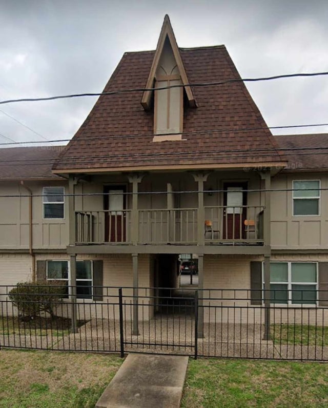 view of property featuring a fenced front yard