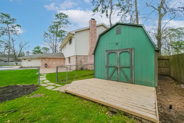 view of shed featuring a fenced backyard