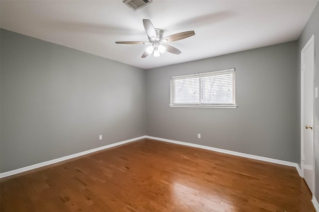 unfurnished bedroom with visible vents, ceiling fan, baseboards, and wood finished floors