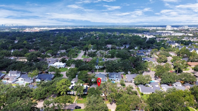 birds eye view of property with a residential view