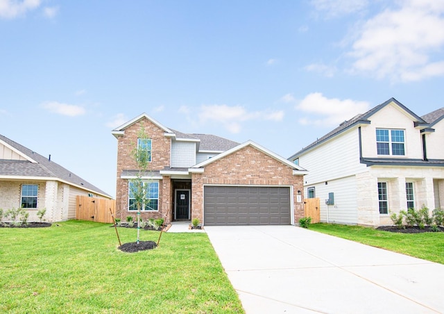 16527 Willow Forest Dr, Conroe, TX 77302 - traditional-style house with brick siding, a garage, concrete driveway, and a gate