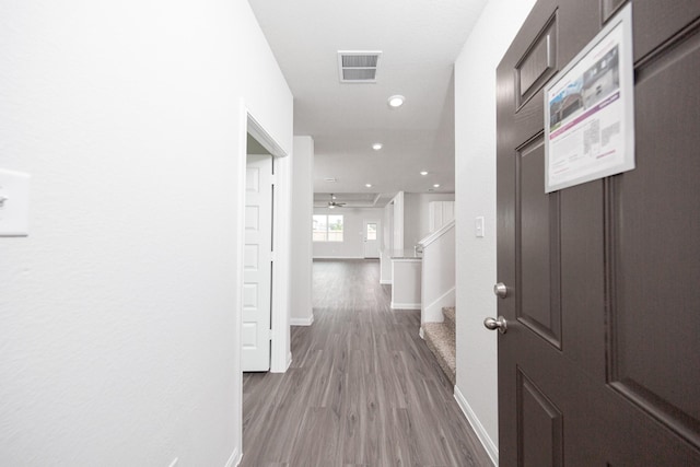 16527 Willow Forest Dr, Conroe, TX 77302 - corridor featuring baseboards, recessed lighting, and light wood-style floors
