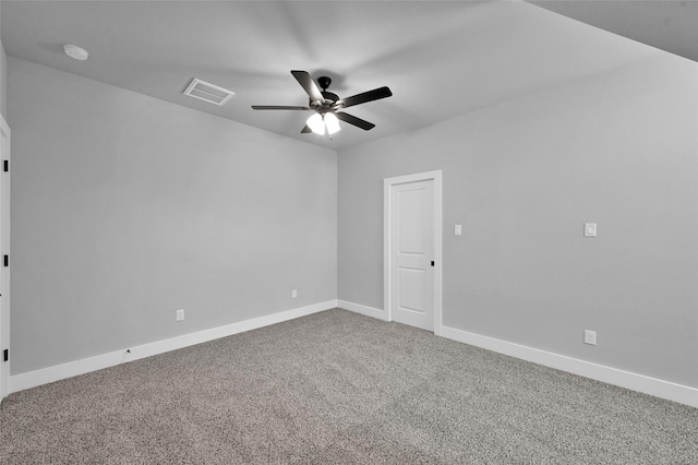 unfurnished room featuring visible vents, carpet flooring, baseboards, and ceiling fan