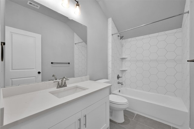 bathroom with visible vents, toilet, shower / tub combination, tile patterned flooring, and vanity