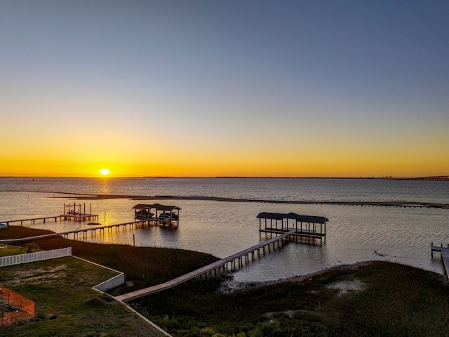 view of dock featuring a water view and boat lift