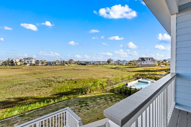 balcony featuring a residential view