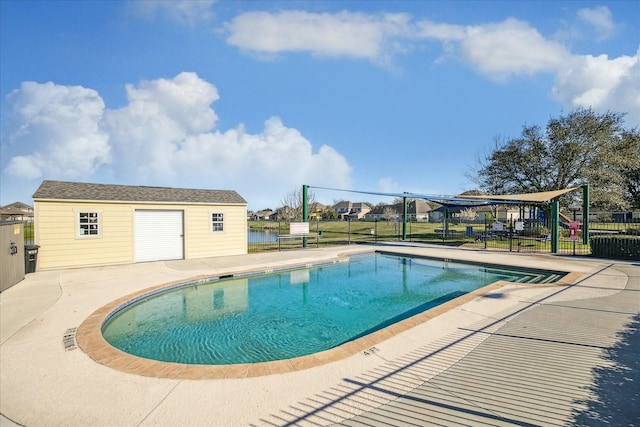 view of swimming pool with a fenced in pool, a patio, and fence