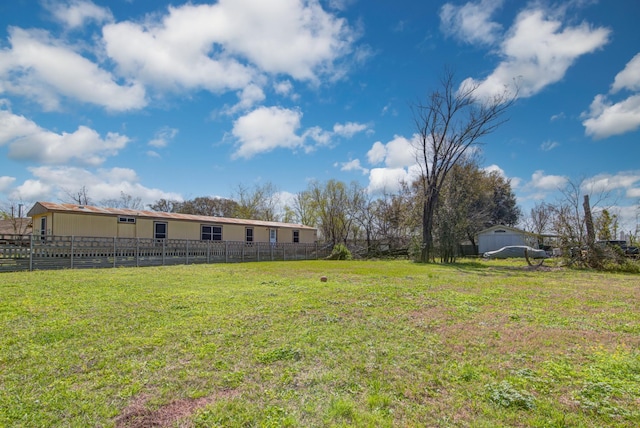 view of yard featuring fence