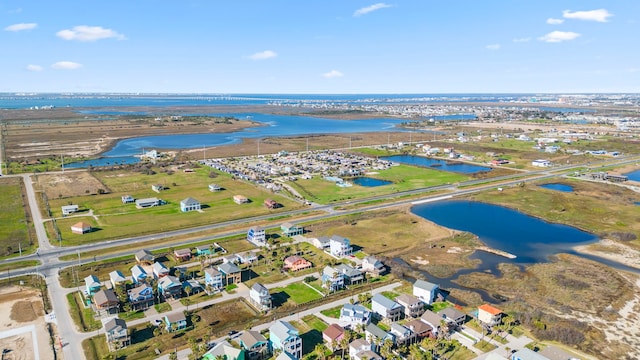 birds eye view of property featuring a residential view and a water view