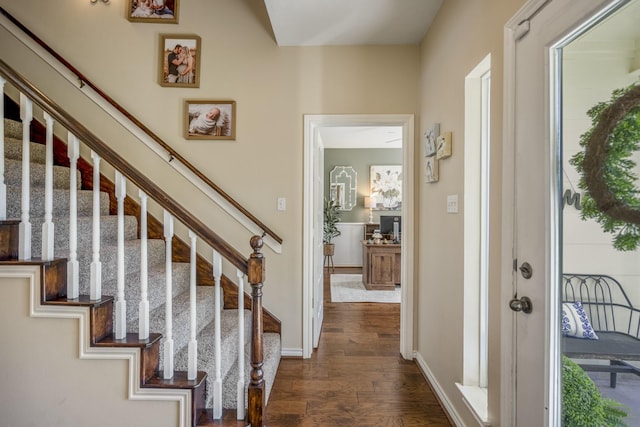 entrance foyer with stairs, french doors, baseboards, and dark wood-style flooring