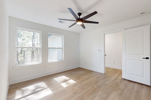 unfurnished bedroom with visible vents, baseboards, ceiling fan, and light wood finished floors