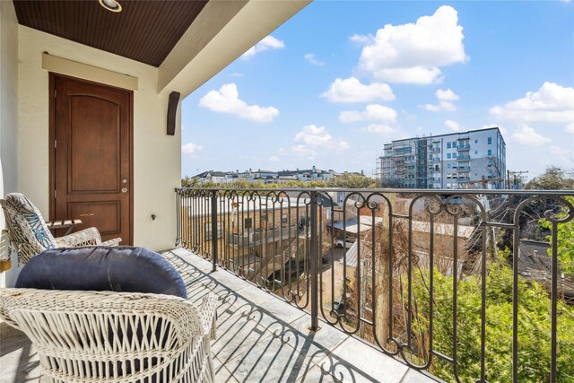 balcony featuring a city view