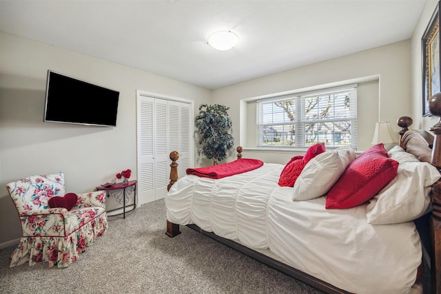 carpeted bedroom featuring a closet