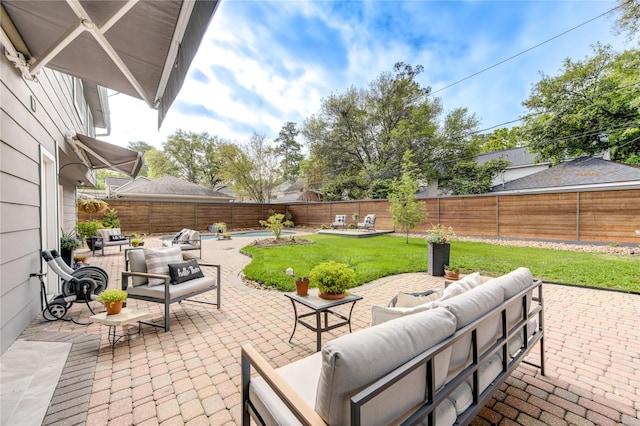 view of patio / terrace featuring an outdoor living space and a fenced backyard