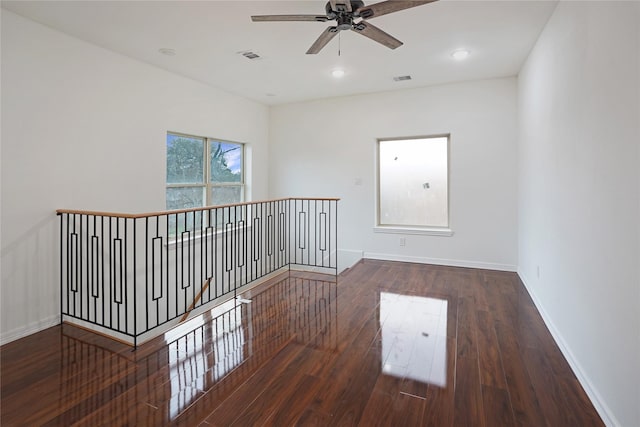 empty room featuring visible vents, hardwood / wood-style flooring, recessed lighting, baseboards, and ceiling fan