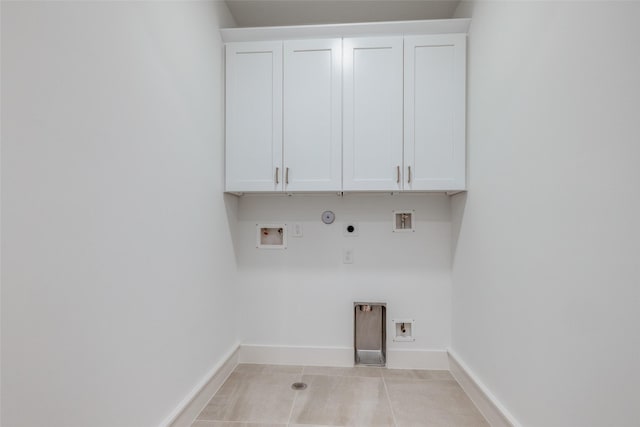 laundry room with electric dryer hookup, hookup for a gas dryer, baseboards, and hookup for a washing machine