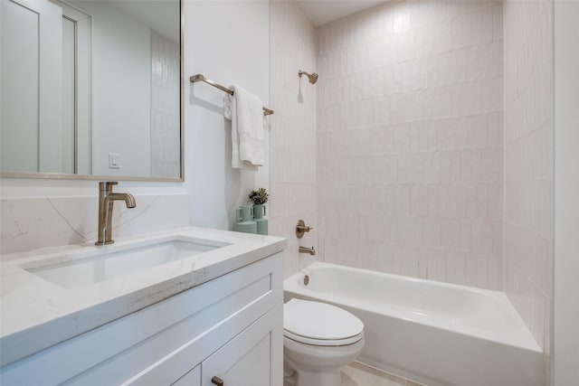 bathroom featuring toilet, vanity, and washtub / shower combination