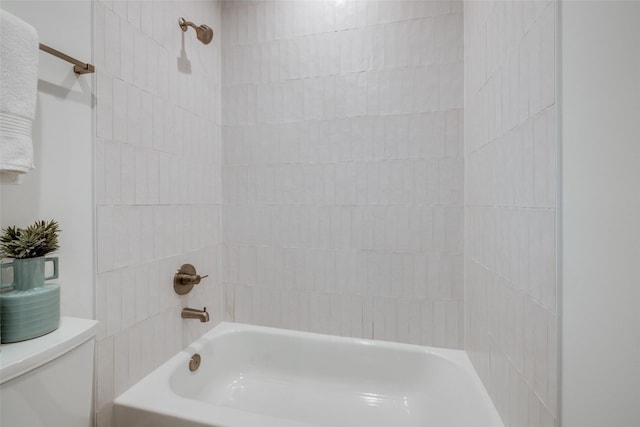 full bathroom with bathtub / shower combination and toilet