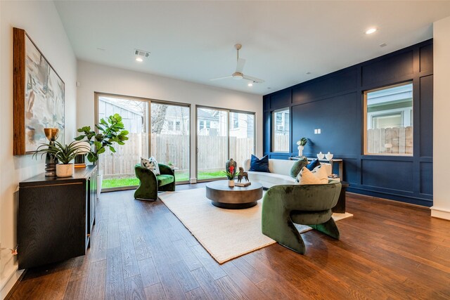 living room with recessed lighting, visible vents, wood finished floors, and ceiling fan