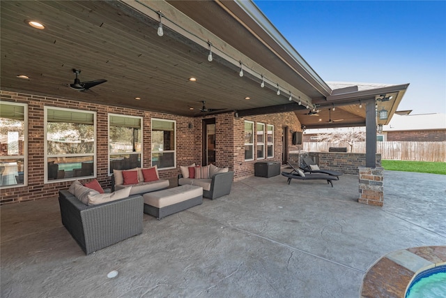 view of patio / terrace featuring an outdoor hangout area, ceiling fan, and fence