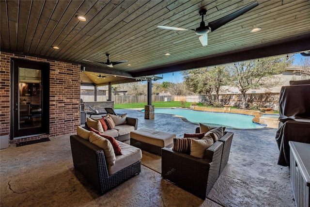 view of patio with a fenced in pool, an outdoor hangout area, a fenced backyard, and ceiling fan