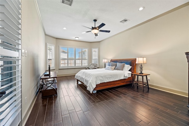 bedroom featuring visible vents, baseboards, and dark wood-style flooring