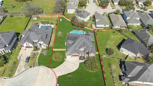 birds eye view of property with a residential view