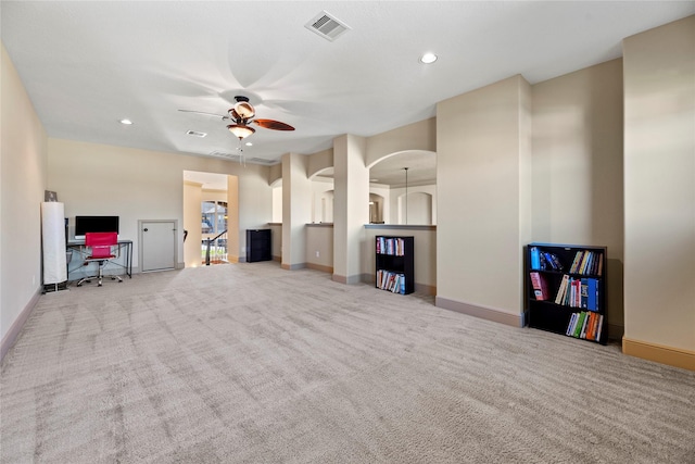 unfurnished living room with recessed lighting, visible vents, carpet floors, and ceiling fan