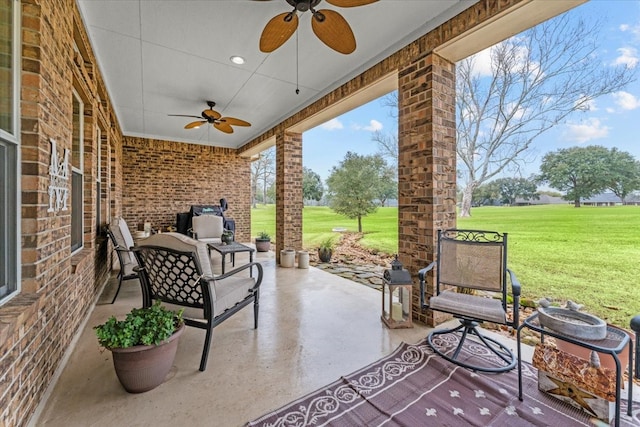 view of patio with ceiling fan