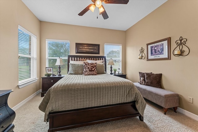 bedroom featuring carpet flooring, baseboards, and a ceiling fan